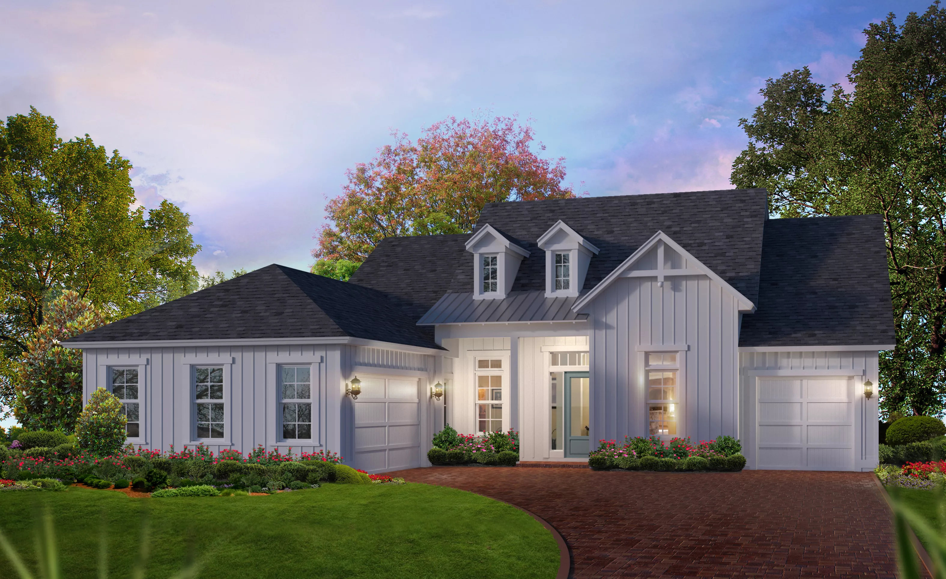 Farmhouse exterior of the Egret VII home featuring white vertical siding, dark shingled roof, dormers, and a brick driveway.