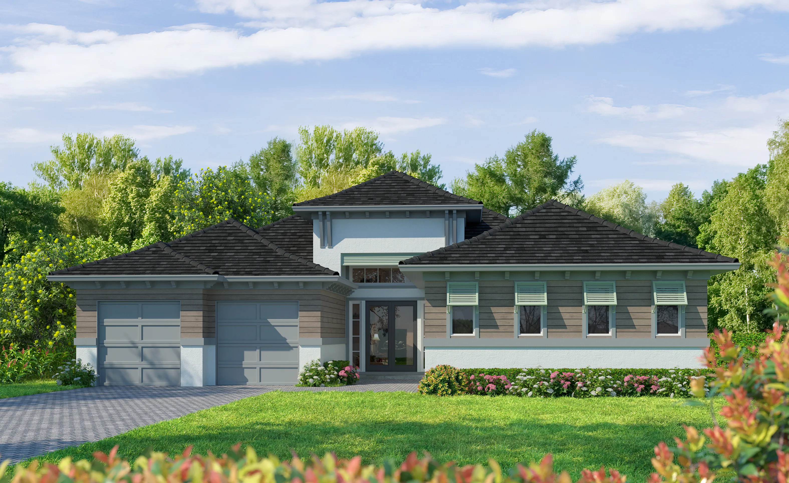 St. Lucia model home with West Indies Transitional exterior, featuring a two-car garage, dark shingle roof, and wood siding.