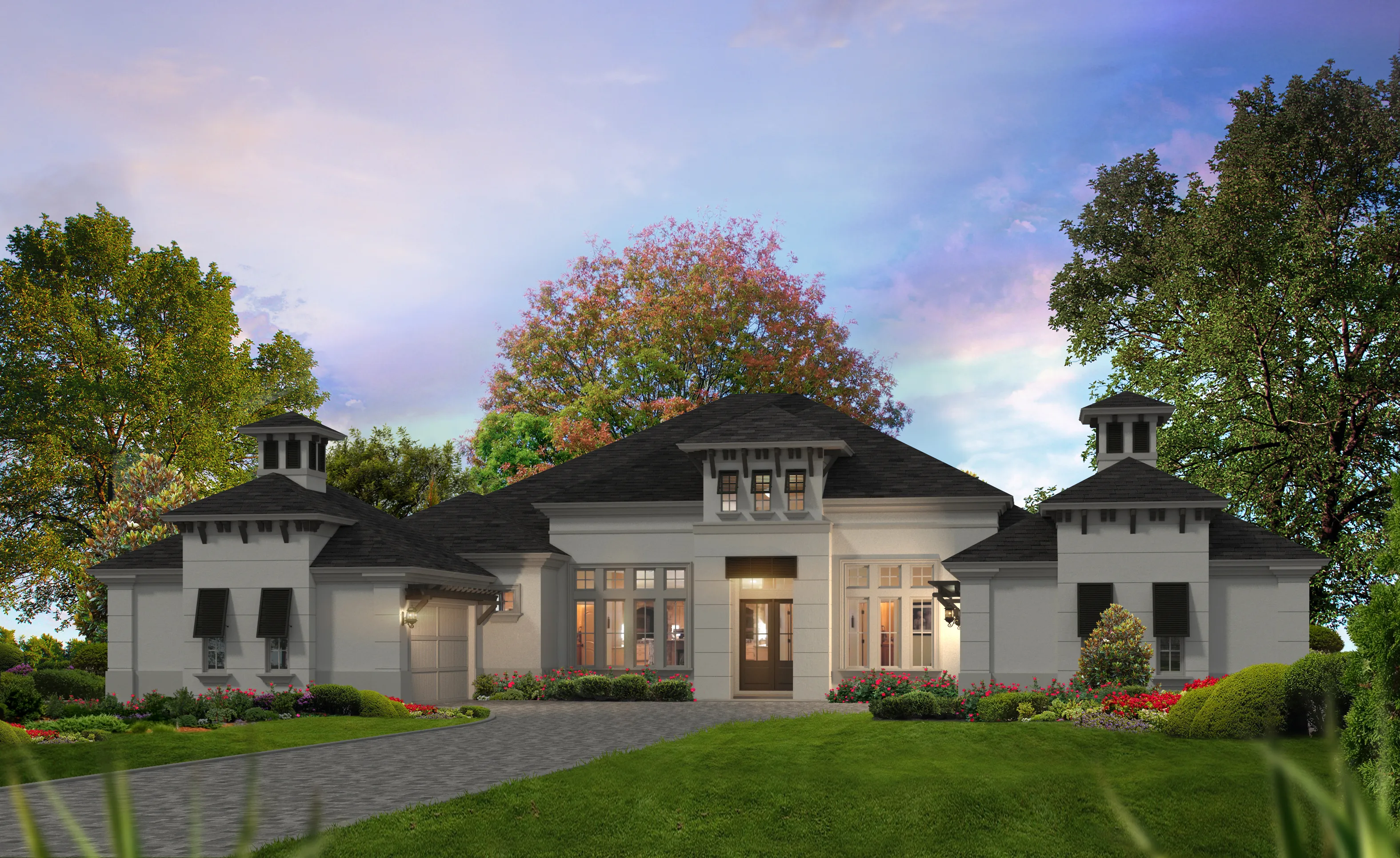 Monaco West Indies exterior features light stucco, dark roof, three towers, and a paved driveway with landscaped gardens.